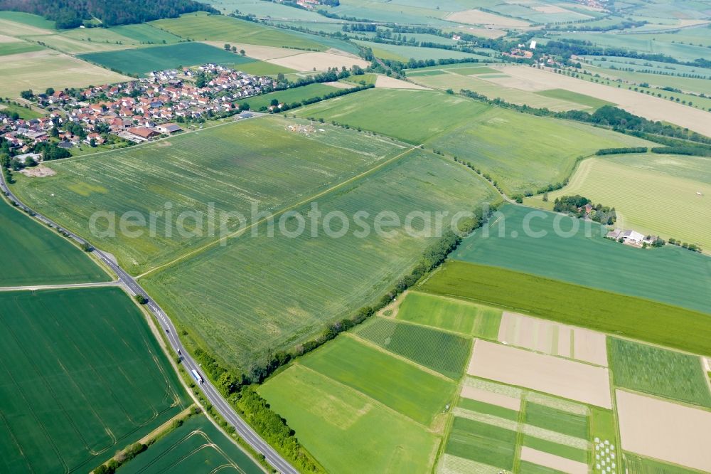 Aerial image Neu-Eichenberg - Village view on the edge of agricultural fields and land in Neu-Eichenberg in the state Hesse, Germany