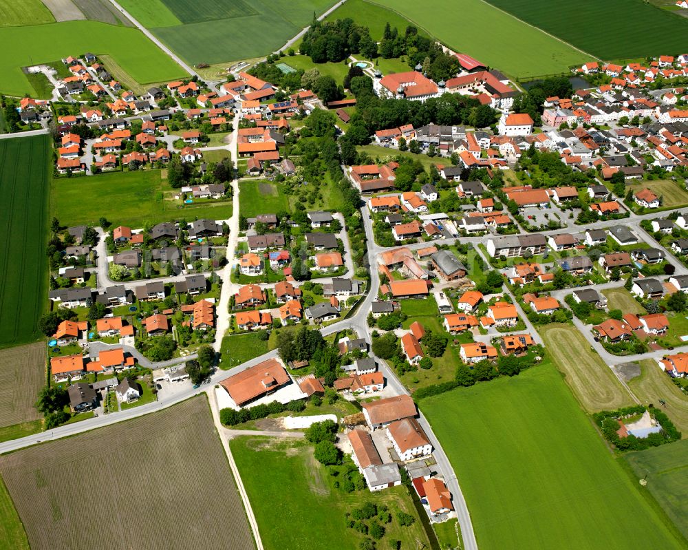 Neue Heimat from above - Village view on the edge of agricultural fields and land in Neue Heimat in the state Bavaria, Germany