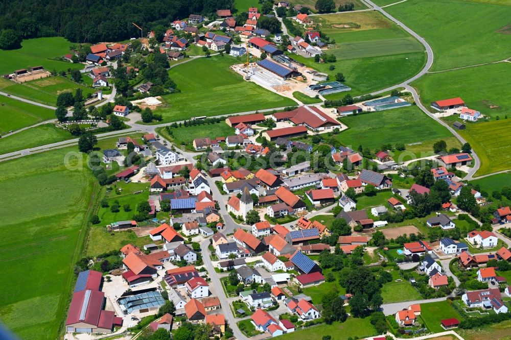 Oberbuchfeld from above - Village view on the edge of agricultural fields and land in Oberbuchfeld in the state Bavaria, Germany