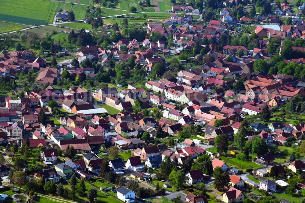 Aerial image Oberdorla - Village view on the edge of agricultural fields and land in Oberdorla in the state Thuringia, Germany