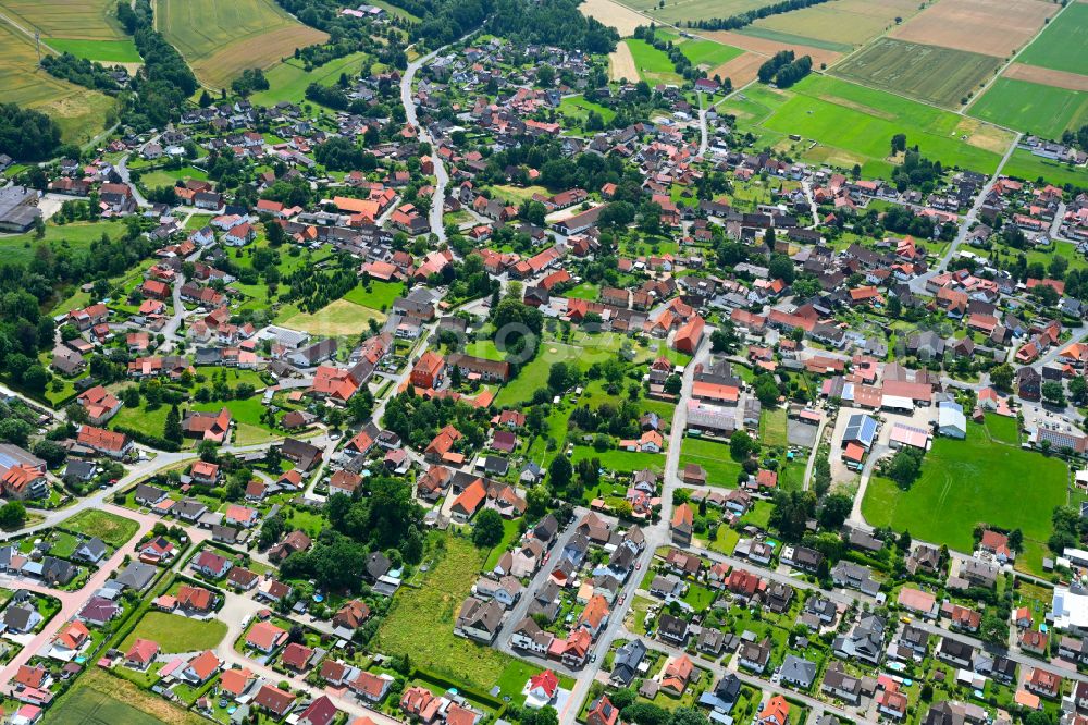 Aerial photograph Osterode am Harz - Village view on the edge of agricultural fields and land in Osterode am Harz in the state Lower Saxony, Germany