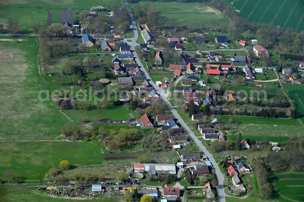 Aerial photograph Petershagen - Village view on the edge of agricultural fields and land in Petershagen in the state Brandenburg, Germany