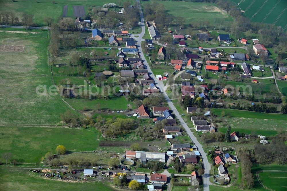 Aerial image Petershagen - Village view on the edge of agricultural fields and land in Petershagen in the state Brandenburg, Germany