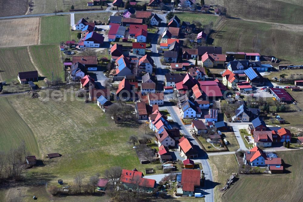 Aerial image Pfaffenberg - Village view on the edge of agricultural fields and land in Pfaffenberg in the state Bavaria, Germany