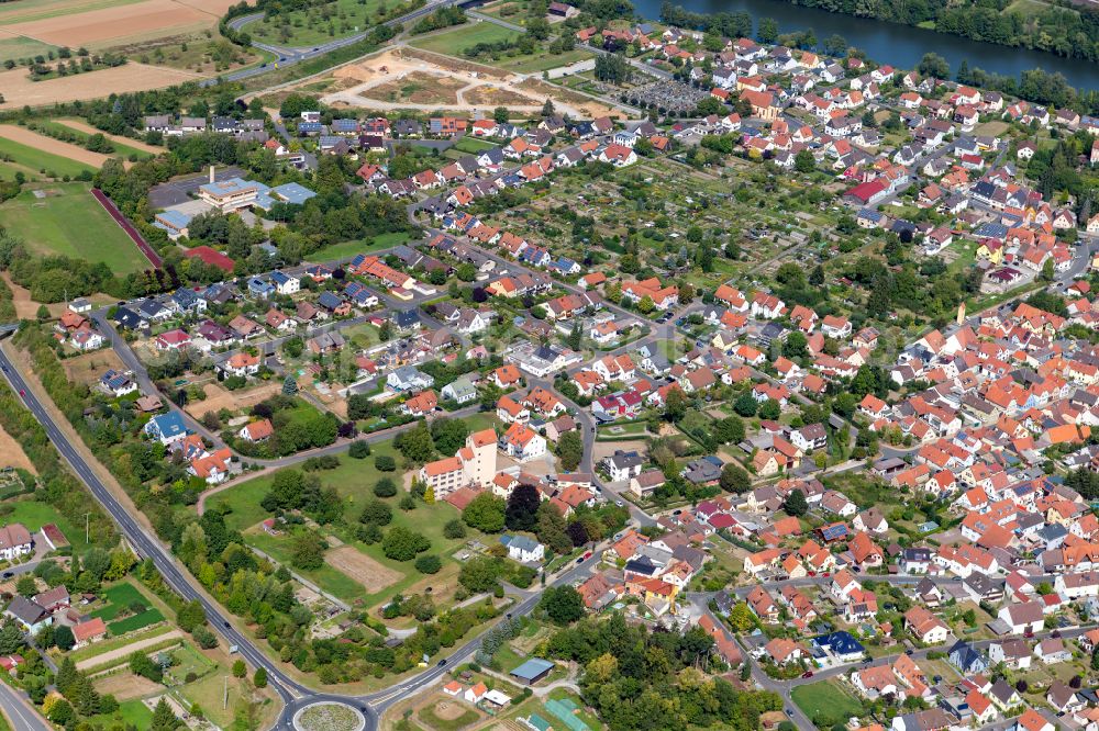 Aerial image Retzbach - Village view on the edge of agricultural fields and land in Retzbach in the state Bavaria, Germany