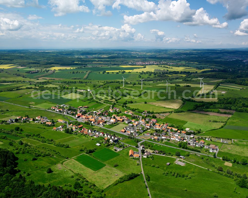 Rixfeld from above - Village view on the edge of agricultural fields and land in Rixfeld in the state Hesse, Germany