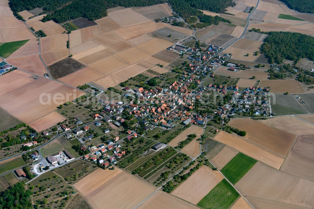Aerial image Roden - Village view on the edge of agricultural fields and land in Roden in the state Bavaria, Germany