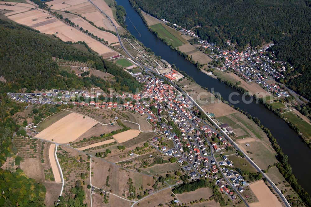 Rodenbach from above - Village view on the edge of agricultural fields and land in Rodenbach in the state Bavaria, Germany