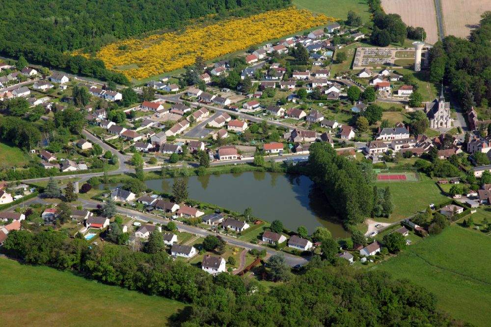 Aerial image Saint-Florent - Village view on the edge of agricultural fields and land in Saint-Florent in Centre-Val de Loire, France