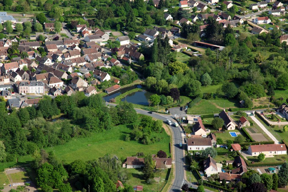 Aerial image Saint-Florent - Village view on the edge of agricultural fields and land in Saint-Florent in Centre-Val de Loire, France