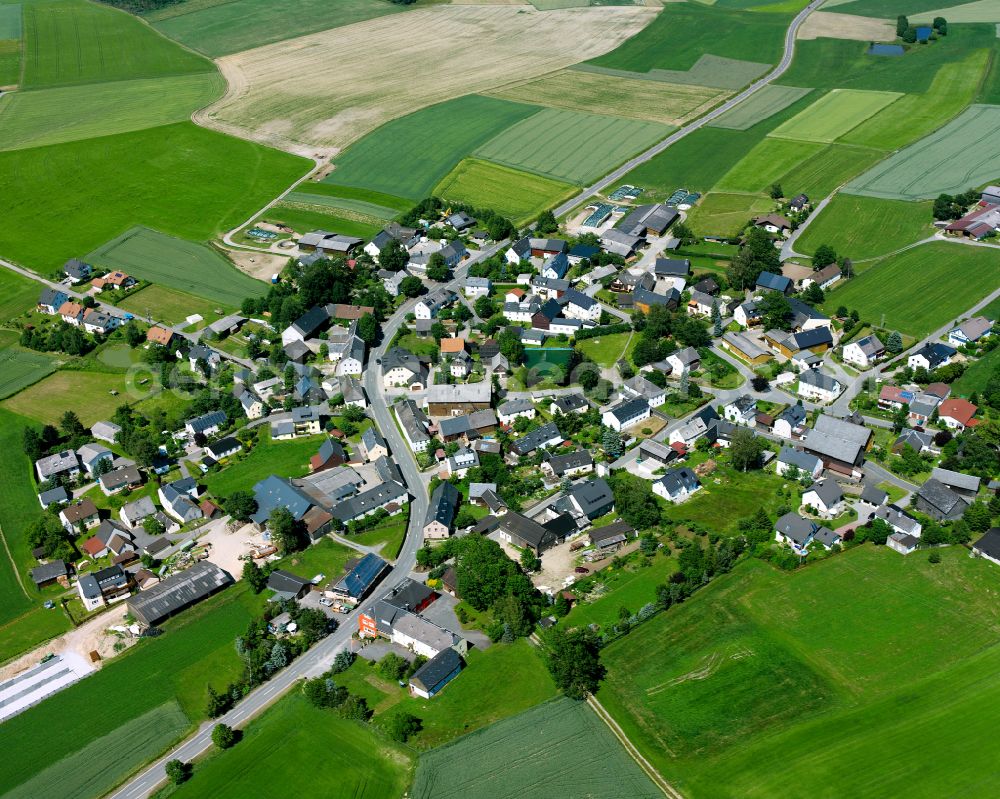 Schauenstein from the bird's eye view: Village view on the edge of agricultural fields and land in the district Neudorf in Schauenstein in the state Bavaria, Germany