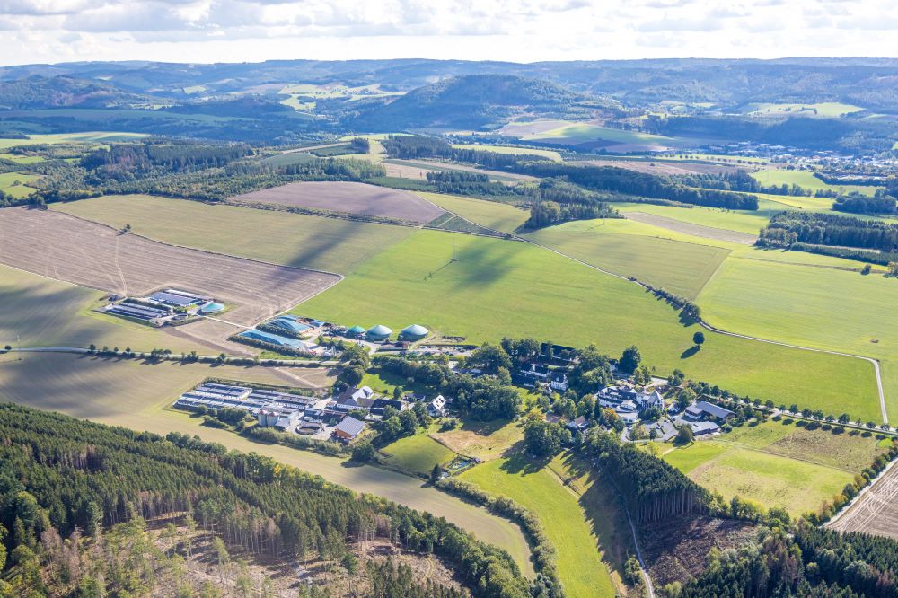 Aerial photograph Schmallenberg - Village view on the edge of agricultural fields and land in the district Ebbinghof in Schmallenberg at Sauerland in the state North Rhine-Westphalia, Germany