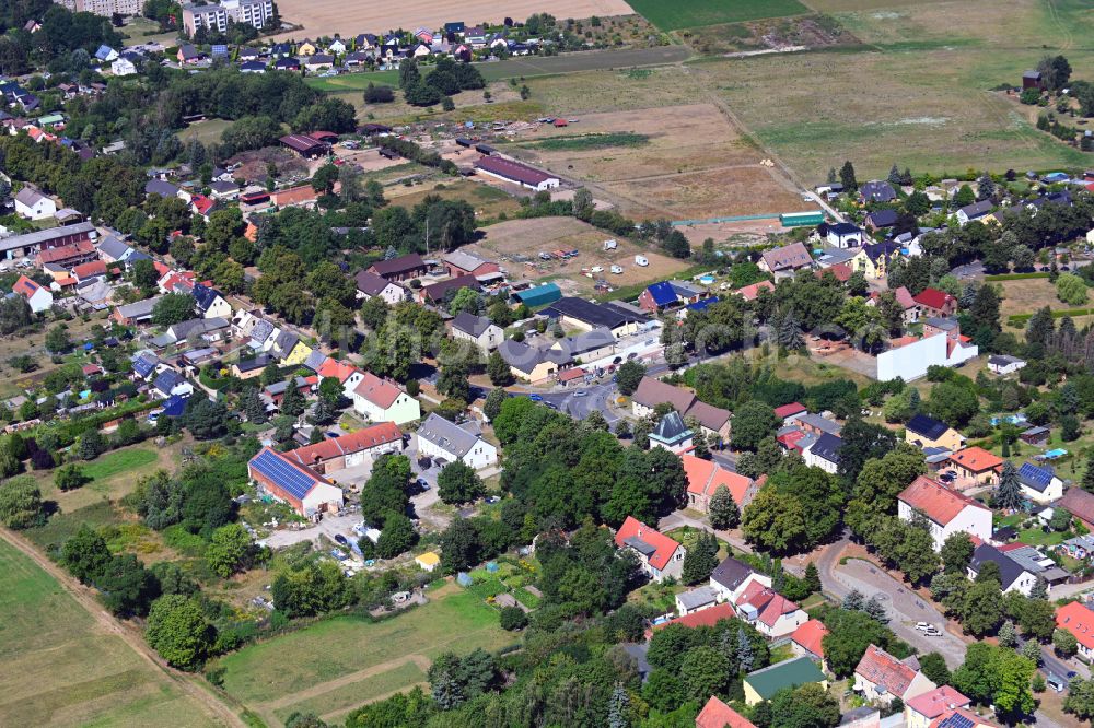 Aerial image Schönerlinde - Village view on the edge of agricultural fields and land in Schoenerlinde in the state Brandenburg, Germany