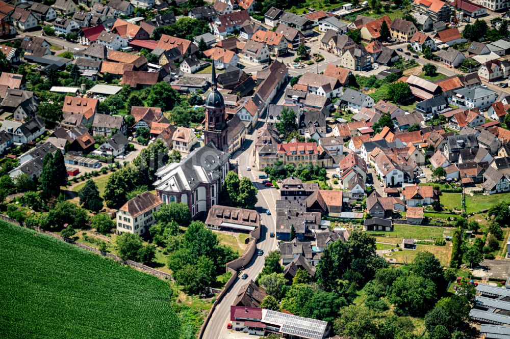 Schuttern from above - Village view on the edge of agricultural fields and land in Schuttern in the state Baden-Wuerttemberg, Germany