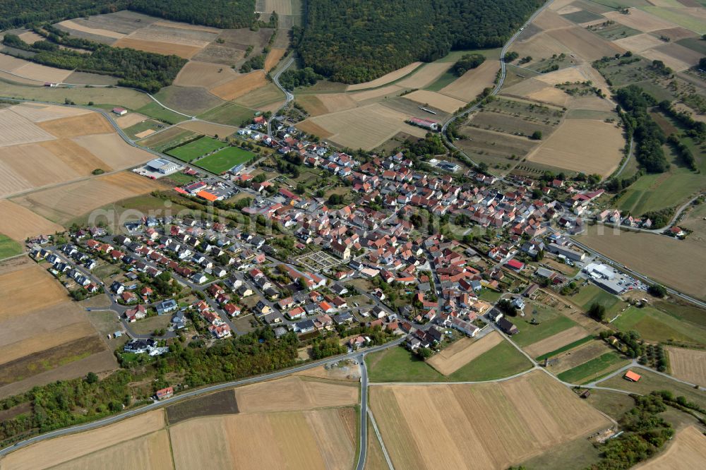 Aerial image Schwebenried - Village view on the edge of agricultural fields and land in Schwebenried in the state Bavaria, Germany