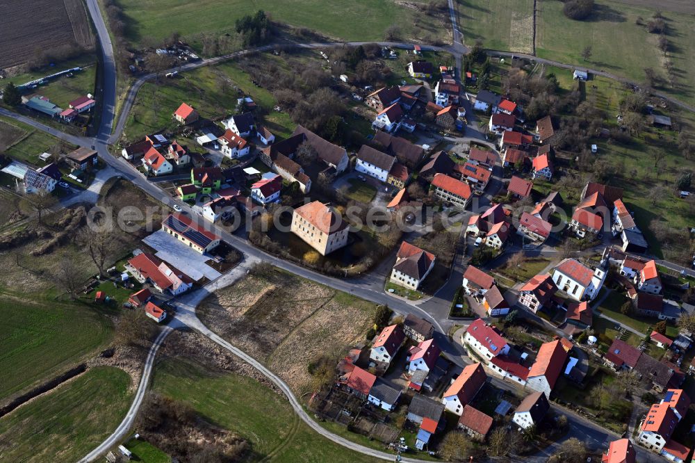 Aerial photograph Schwickershausen - Village view on the edge of agricultural fields and land in Schwickershausen in the state Thuringia, Germany
