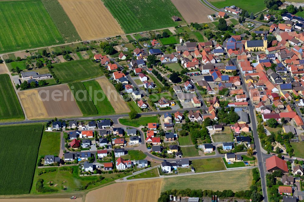 Seligenstadt from above - Village view on the edge of agricultural fields and land in Seligenstadt in the state Bavaria, Germany