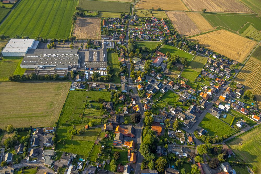 Sönnern from the bird's eye view: Village view on the edge of agricultural fields and land in Soennern in the state North Rhine-Westphalia, Germany