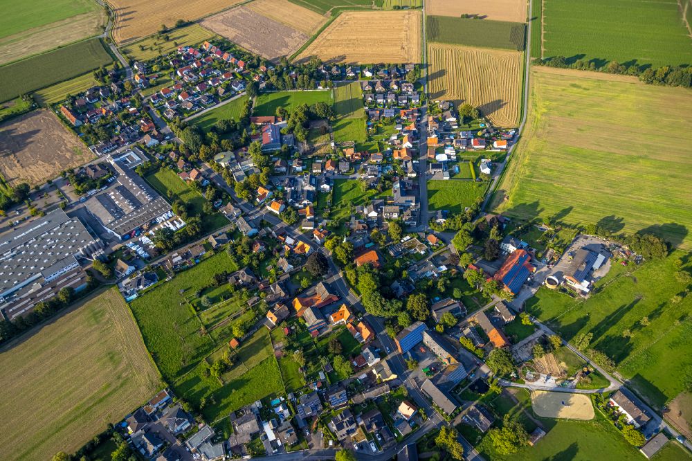 Aerial image Sönnern - Village view on the edge of agricultural fields and land in Sönnern in the state North Rhine-Westphalia, Germany