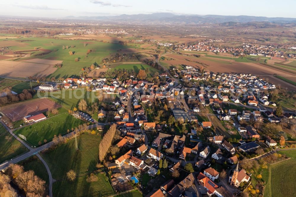 Offenburg from above - Village view on the edge of agricultural fields and land and sporting fields in the district Buehl in Offenburg in the state Baden-Wurttemberg, Germany
