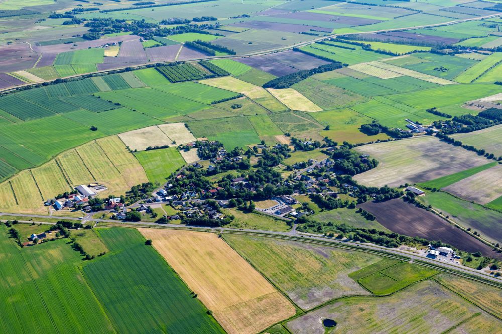 Tondern from the bird's eye view: Village view on the edge of agricultural fields and land in Tondern in Syddanmark, Denmark