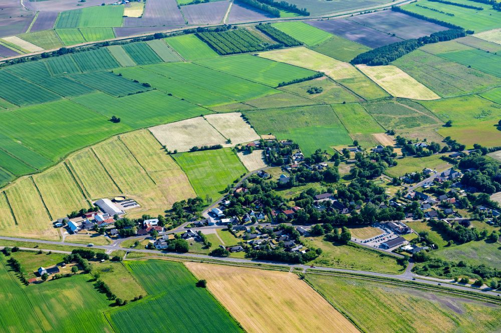 Aerial image Tondern - Village view on the edge of agricultural fields and land in Tondern in Syddanmark, Denmark