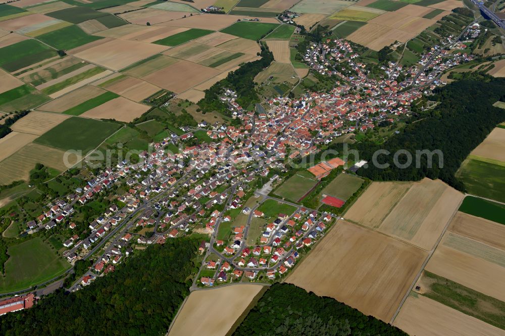 Aerial photograph Theilheim - Village view on the edge of agricultural fields and land in Theilheim in the state Bavaria, Germany
