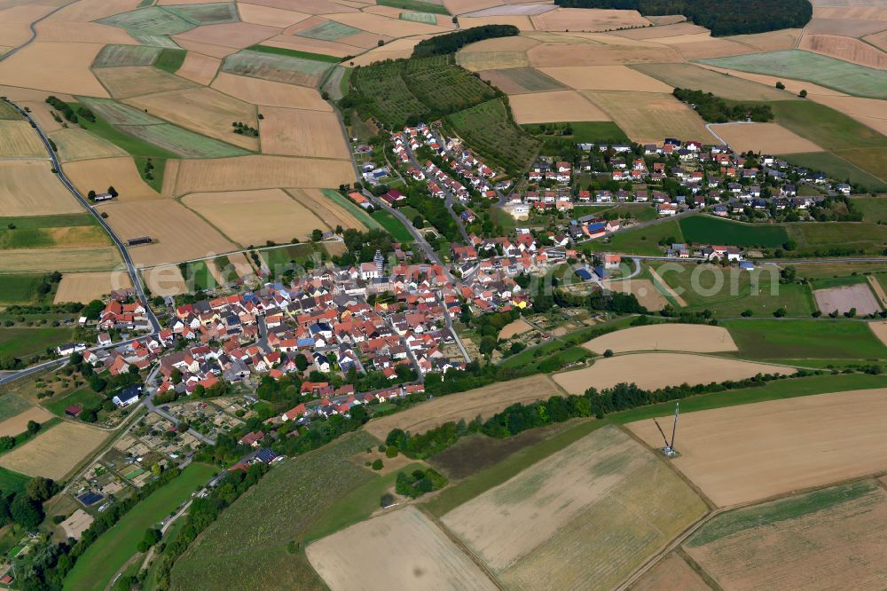 Unteraltertheim from the bird's eye view: Village view on the edge of agricultural fields and land in Unteraltertheim in the state Bavaria, Germany