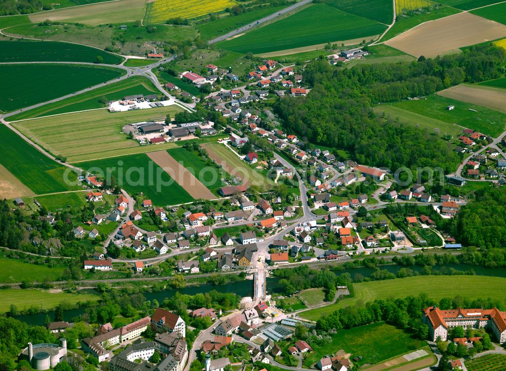 Untermarchtal from above - Village view on the edge of agricultural fields and land in Untermarchtal in the state Baden-Wuerttemberg, Germany
