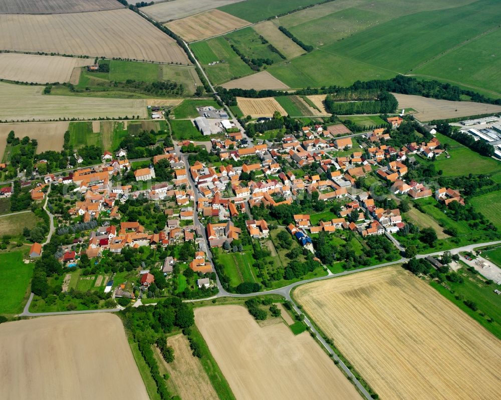 Urbach from the bird's eye view: Village view on the edge of agricultural fields and land in Urbach in the state Thuringia, Germany