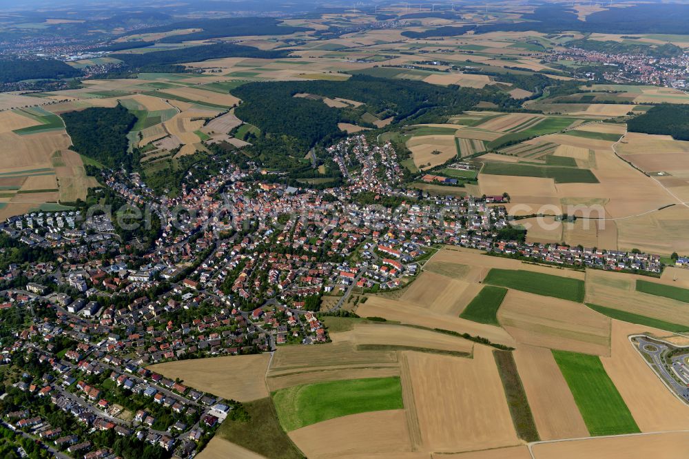 Aerial photograph Versbach - Village view on the edge of agricultural fields and land in Versbach in the state Bavaria, Germany