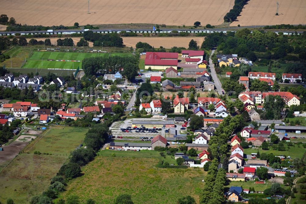 Waltersdorf from above - Village view on the edge of agricultural fields and land in Waltersdorf in the state Brandenburg, Germany