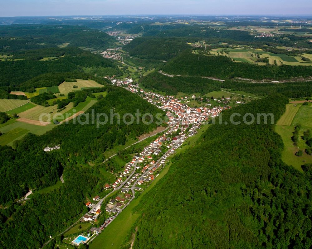 Wiesensteig from above - Village view on the edge of agricultural fields and land in Wiesensteig in the state Baden-Wuerttemberg, Germany
