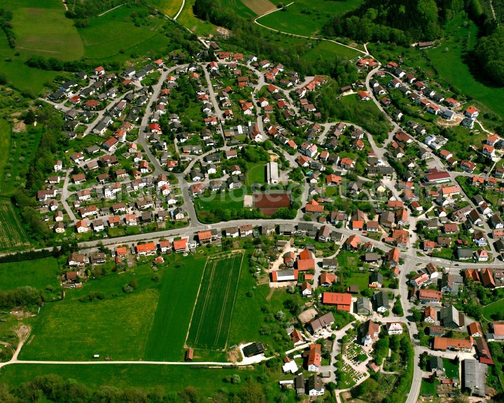Winzingen from the bird's eye view: Village view on the edge of agricultural fields and land in Winzingen in the state Baden-Wuerttemberg, Germany