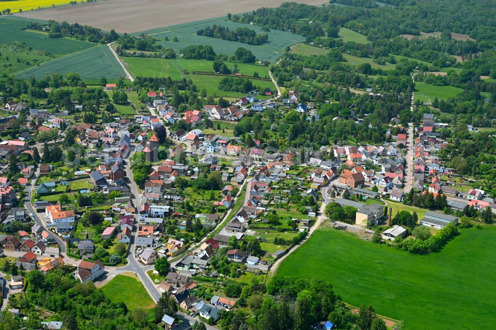 Wolferode from the bird's eye view: Village view on the edge of agricultural fields and land in Wolferode in the state Saxony-Anhalt, Germany