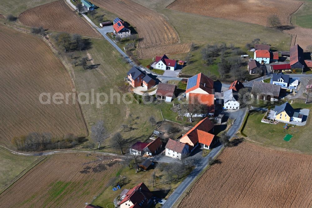 Aerial image Zauppenberg - Village view on the edge of agricultural fields and land in Zauppenberg in the state Bavaria, Germany