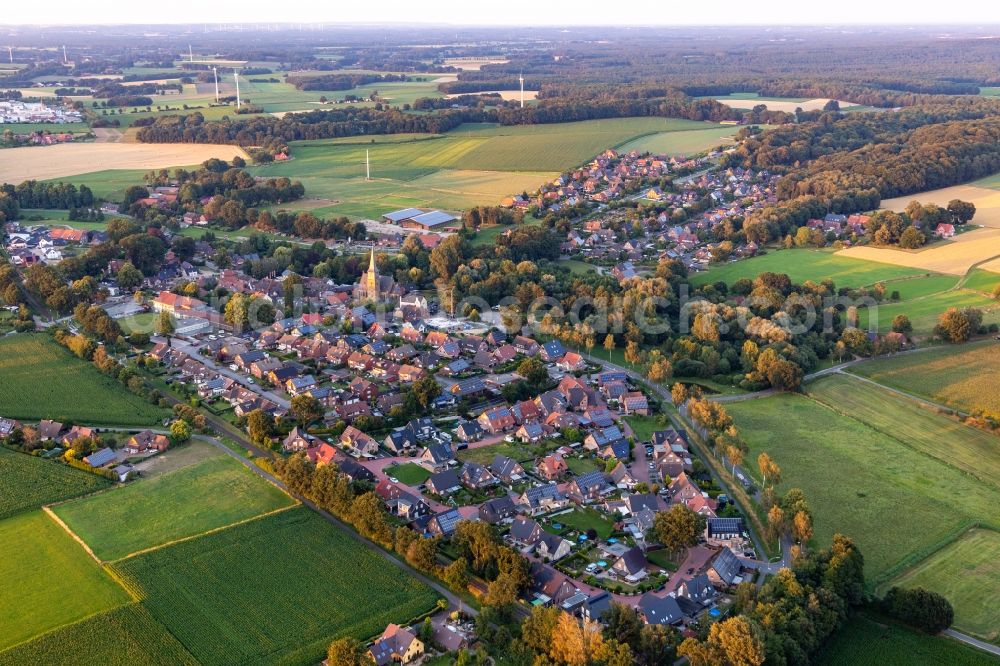 Reken from the bird's eye view: Town View of the streets and houses of the residential areas in Reken in the state North Rhine-Westphalia, Germany