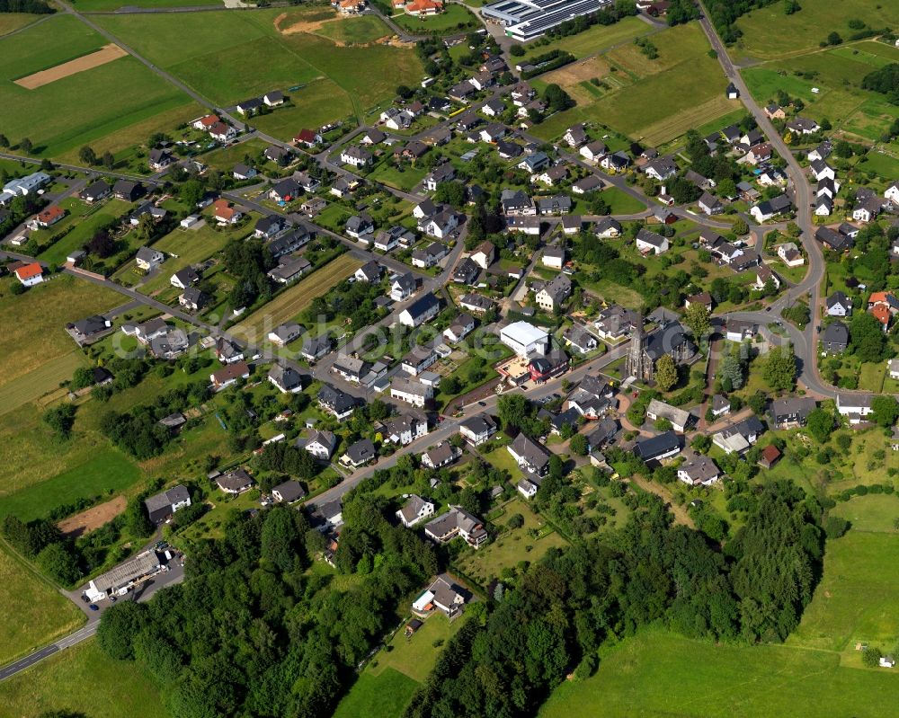 Aerial image Rosenheim (Landkreis Altenkirchen) - View of Rosenheim (District of Altenkirchen) in the state of Rhineland-Palatinate. Rosenheim is located in the Westerwald region, surrounded by wooded hills and is characterised by agriculture. A former mining pit - Rosenheimer Lay - is located in the North of the municipiality. Today it is a nature park