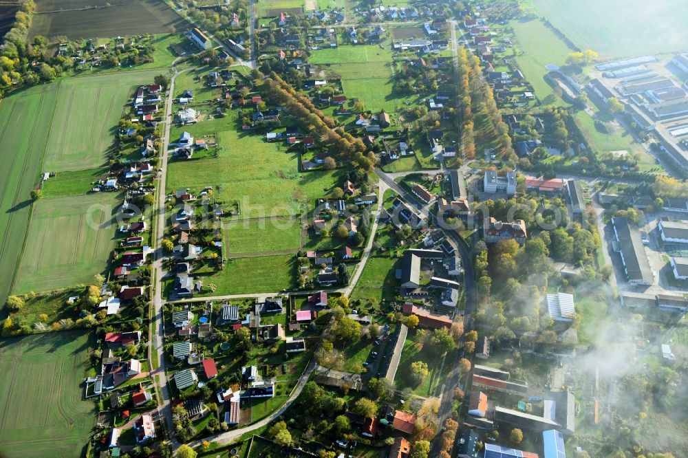 Roskow from the bird's eye view: Town View of the streets and houses of the residential areas in Roskow in the state Brandenburg, Germany