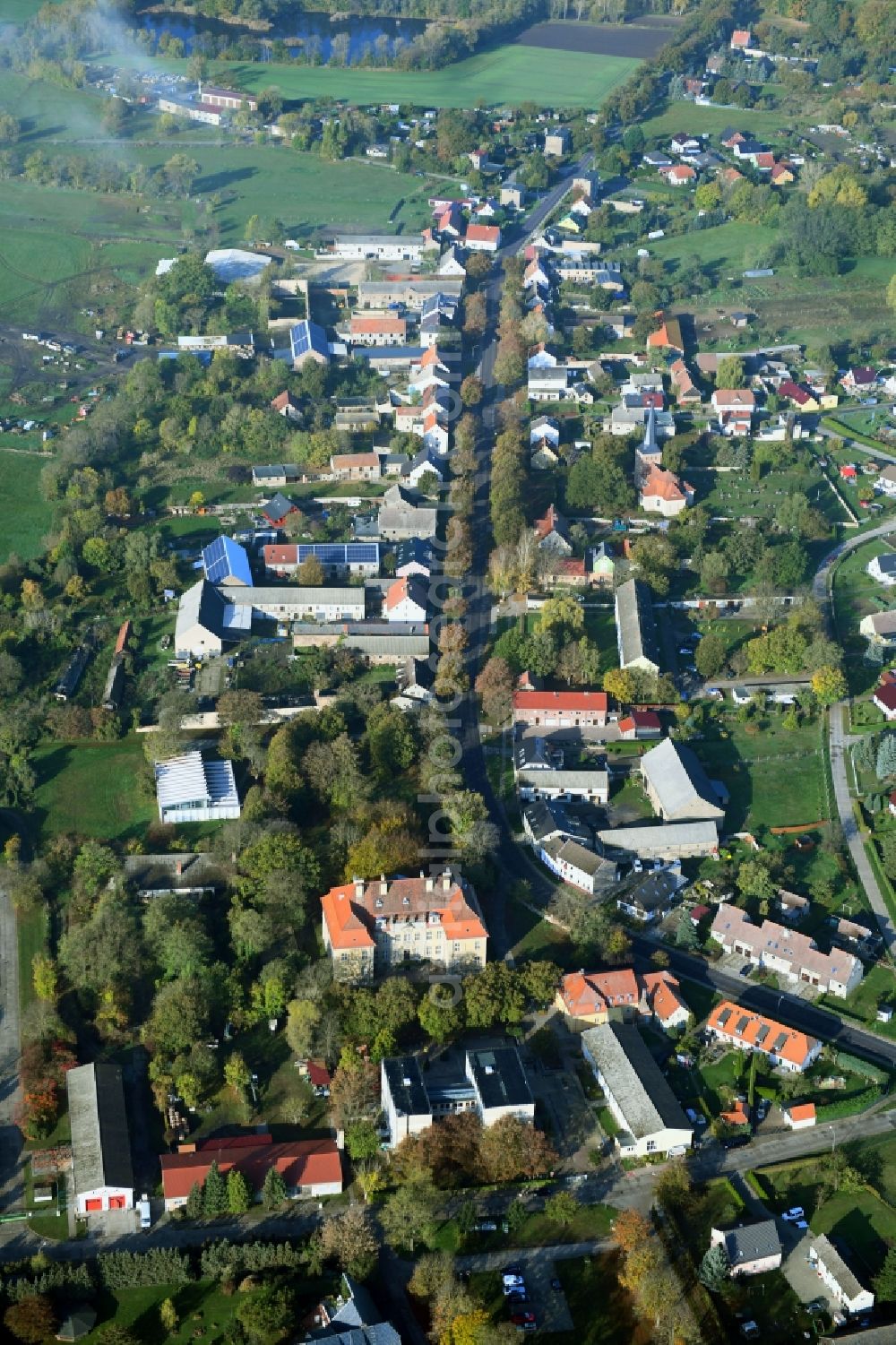 Roskow from above - Town View of the streets and houses of the residential areas in Roskow in the state Brandenburg, Germany