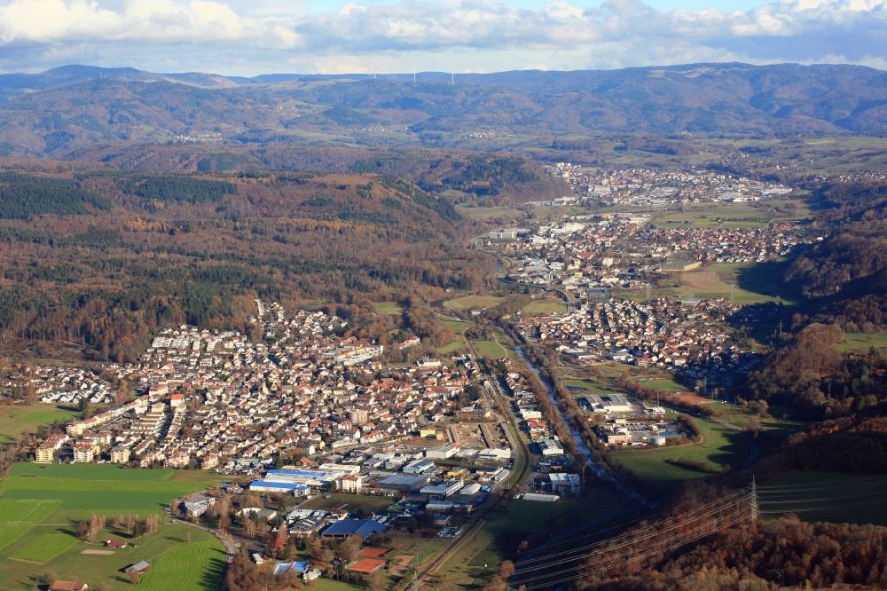 Steinen from the bird's eye view: Town view of the residential areas in Steinen in the state Baden-Wurttemberg, Germany. Looking eastbound allong the valley if the river Wiese over Steinen, Hoellstein, Maulburg and Schopfheim