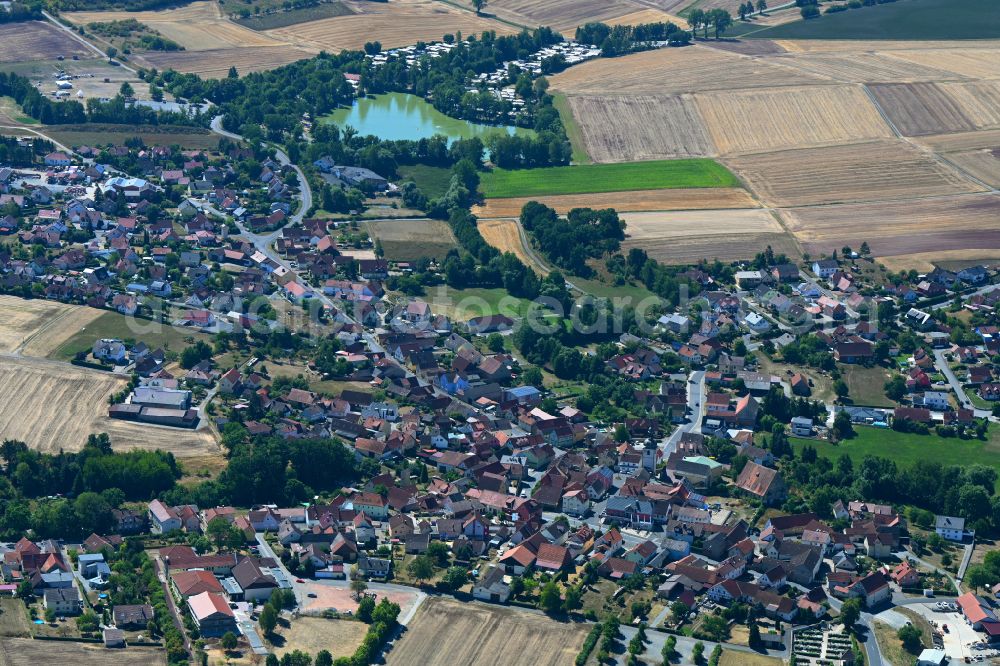 Sulzfeld from the bird's eye view: Town View of the streets and houses of the residential areas on street Wagenweg in Sulzfeld in the state Bavaria, Germany