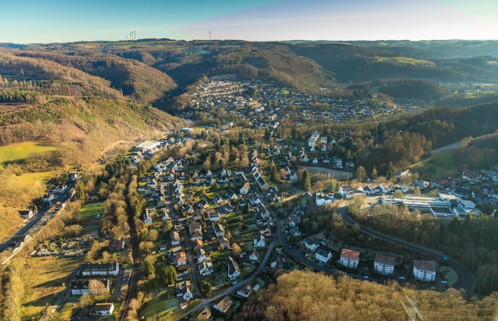 Dahl from above - Location view of the streets and houses of residential areas in the valley landscape surrounded by mountains in Dahl in the state North Rhine-Westphalia, Germany