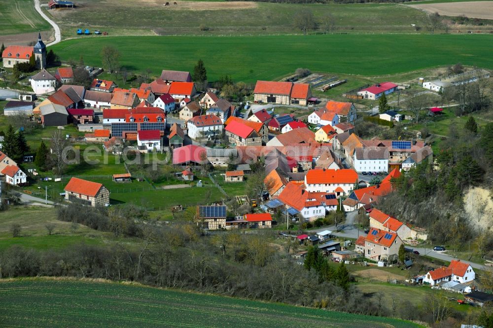 Ehrenstein from above - Location view of the streets and houses of residential areas in the valley landscape surrounded by mountains in Ehrenstein in the state Thuringia, Germany