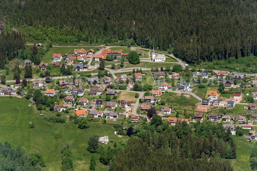 Aerial image Eisenbach (Hochschwarzwald) - Location view of the streets and houses of residential areas in the valley landscape surrounded by mountains in Eisenbach (Hochschwarzwald) in the state Baden-Wuerttemberg, Germany