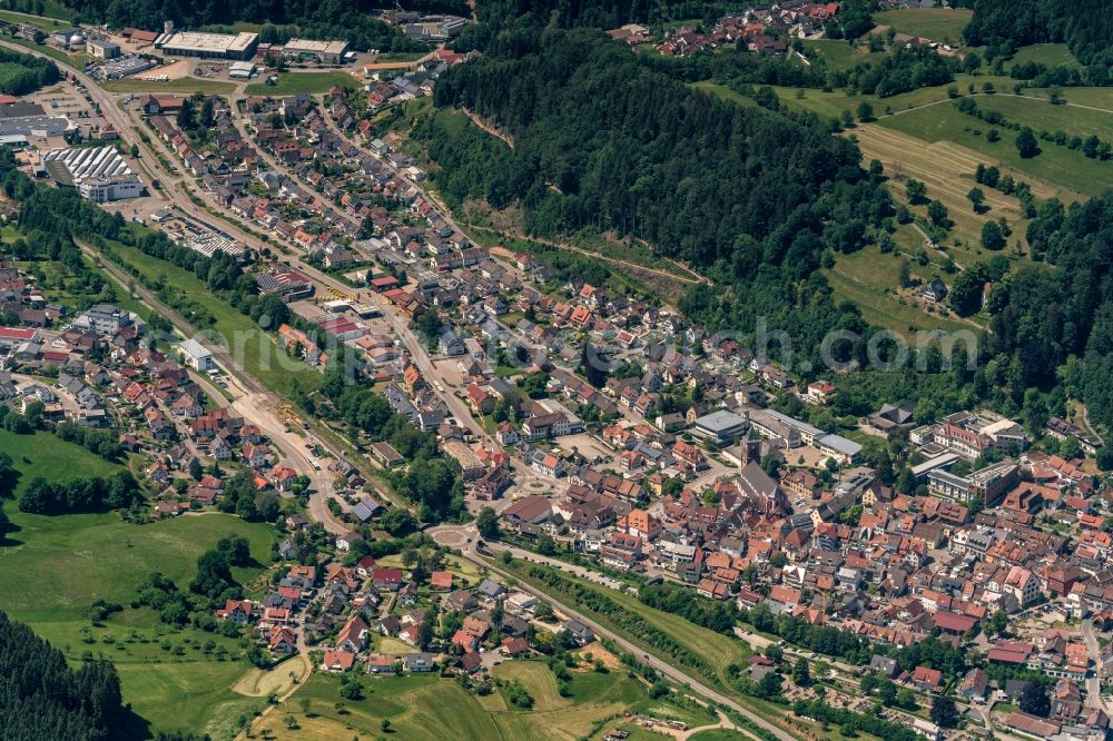 Elzach from above - Location view of the streets and houses of residential areas in the valley landscape surrounded by mountains in Elzach in the state Baden-Wuerttemberg, Germany