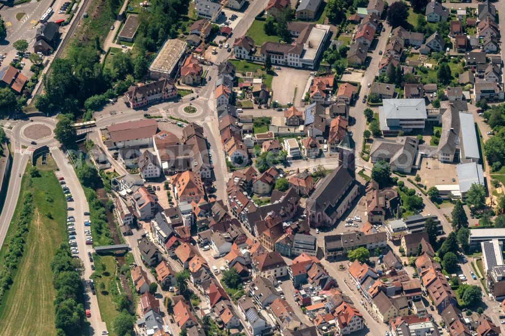 Aerial image Elzach - Location view of the streets and houses of residential areas in the valley landscape surrounded by mountains in Elzach in the state Baden-Wuerttemberg, Germany