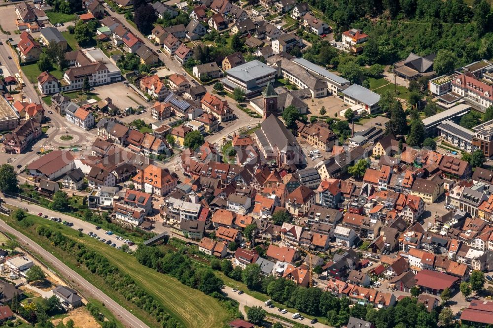 Elzach from above - Location view of the streets and houses of residential areas in the valley landscape surrounded by mountains in Elzach in the state Baden-Wuerttemberg, Germany