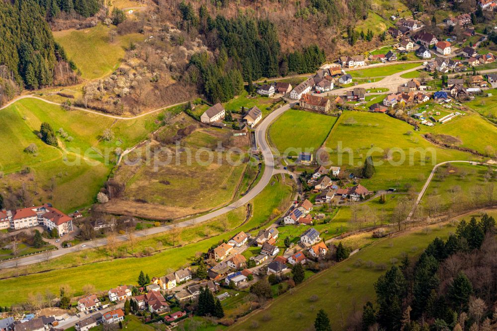 Ettenheimmünster from the bird's eye view: Location view of the streets and houses of residential areas in the valley landscape surrounded by mountains in Ettenheimmuenster in the state Baden-Wuerttemberg, Germany