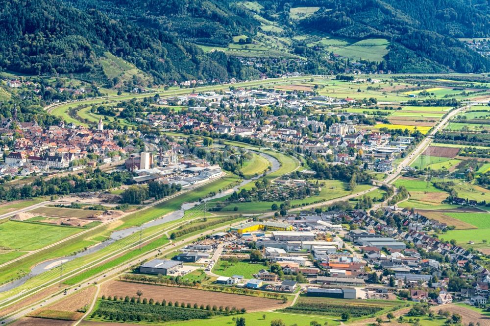 Gengenbach from above - Location view of the streets and houses of residential areas in the valley landscape surrounded by mountains in Gengenbach in the state Baden-Wurttemberg, Germany